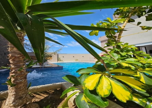 VILLA S+3 AVEC PISCINE & JACUZZI - Bien immobilier à {"id":16,"country_id":219,"name":"NABEUL","slug":"nabeul"} - Image 2 - Société Immobilière Haoueria - Agence Immobilière Société Immobilière Haoueria